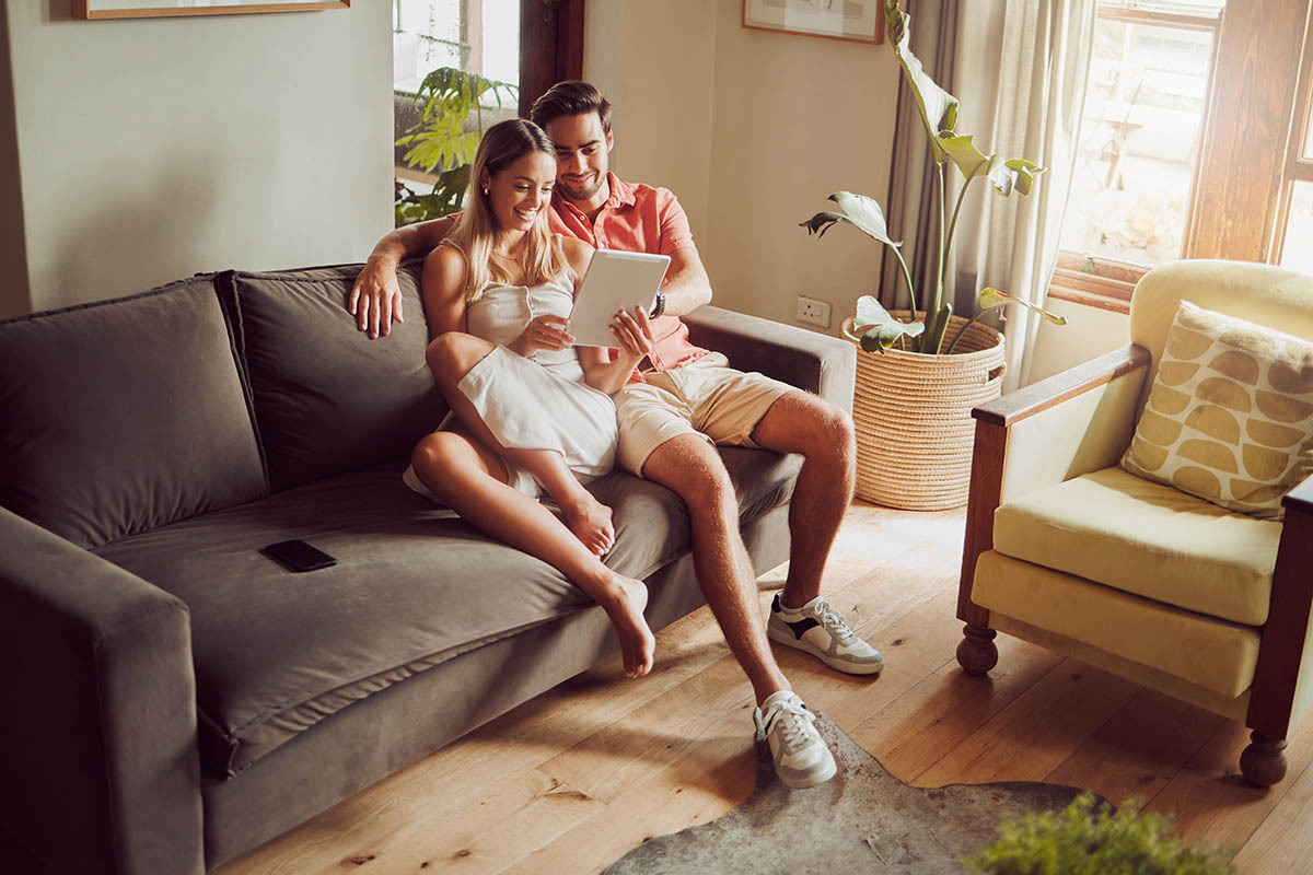 We have a connection stronger than wifi. Shot of a young couple using a digital tablet together at home. hvacServices 3 1200x800 1